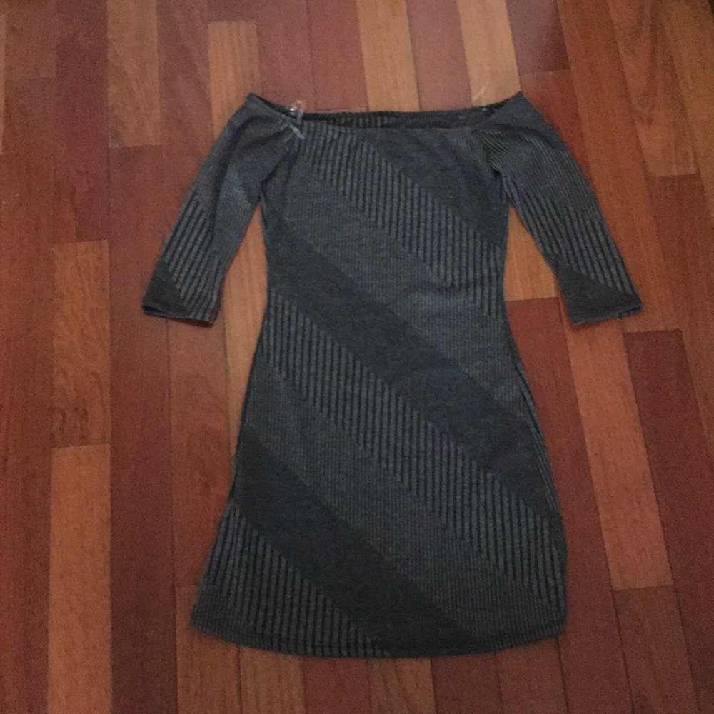 Over the shoulder grey dress.